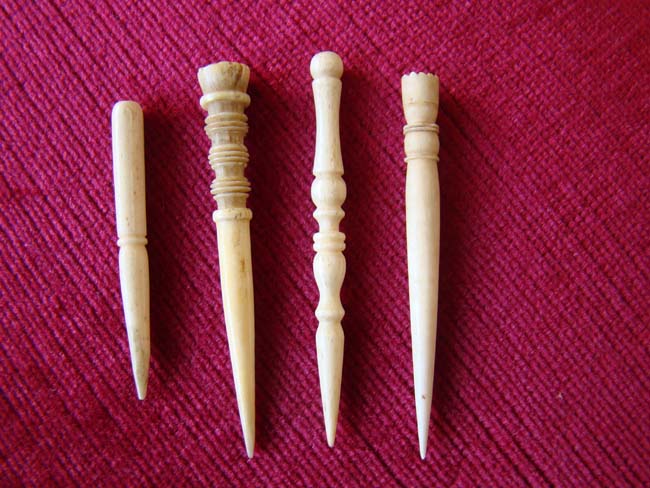 A group of four 19th century sailor-made whale bone bodkins
